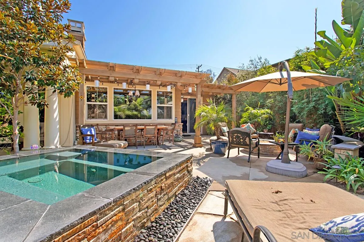 1938 Sheridan Road Encinitas, CA 92024 - Photo 12 of 14 a view of a patio with swimming pool table and chairs
