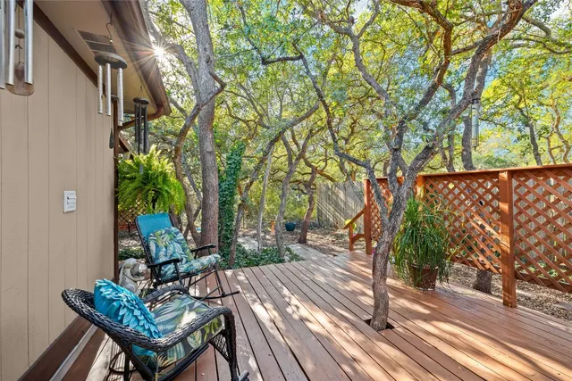 a view of a backyard with sitting area