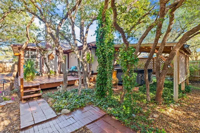 a backyard of a house with lots of green space