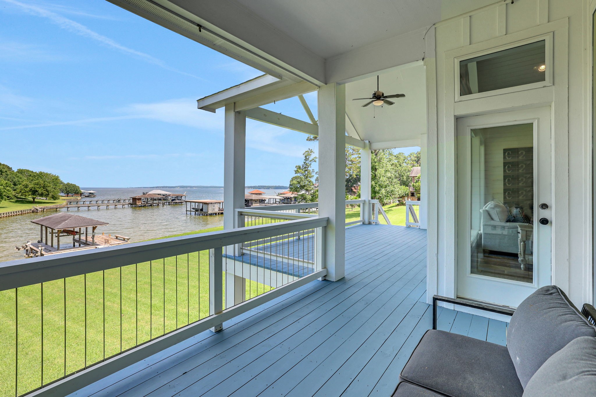 231 Ridge Cove Lane Coldspring, TX 77331 - Photo 27 of 50 From the living area, flow out to the covered back deck
