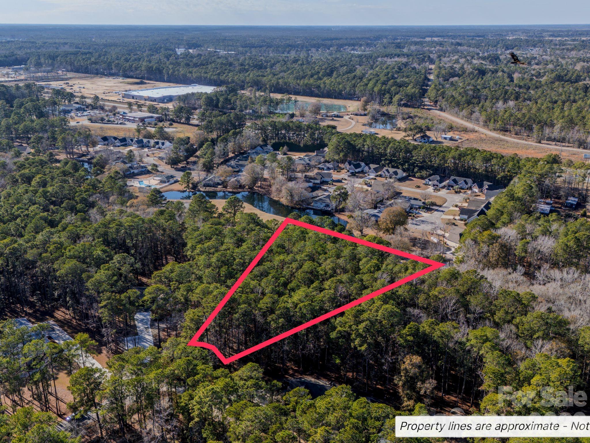 9 Mashie Court Southwest, Unit 9 Calabash, NC 28467 - Photo 11 of 13 a view of a outdoor space