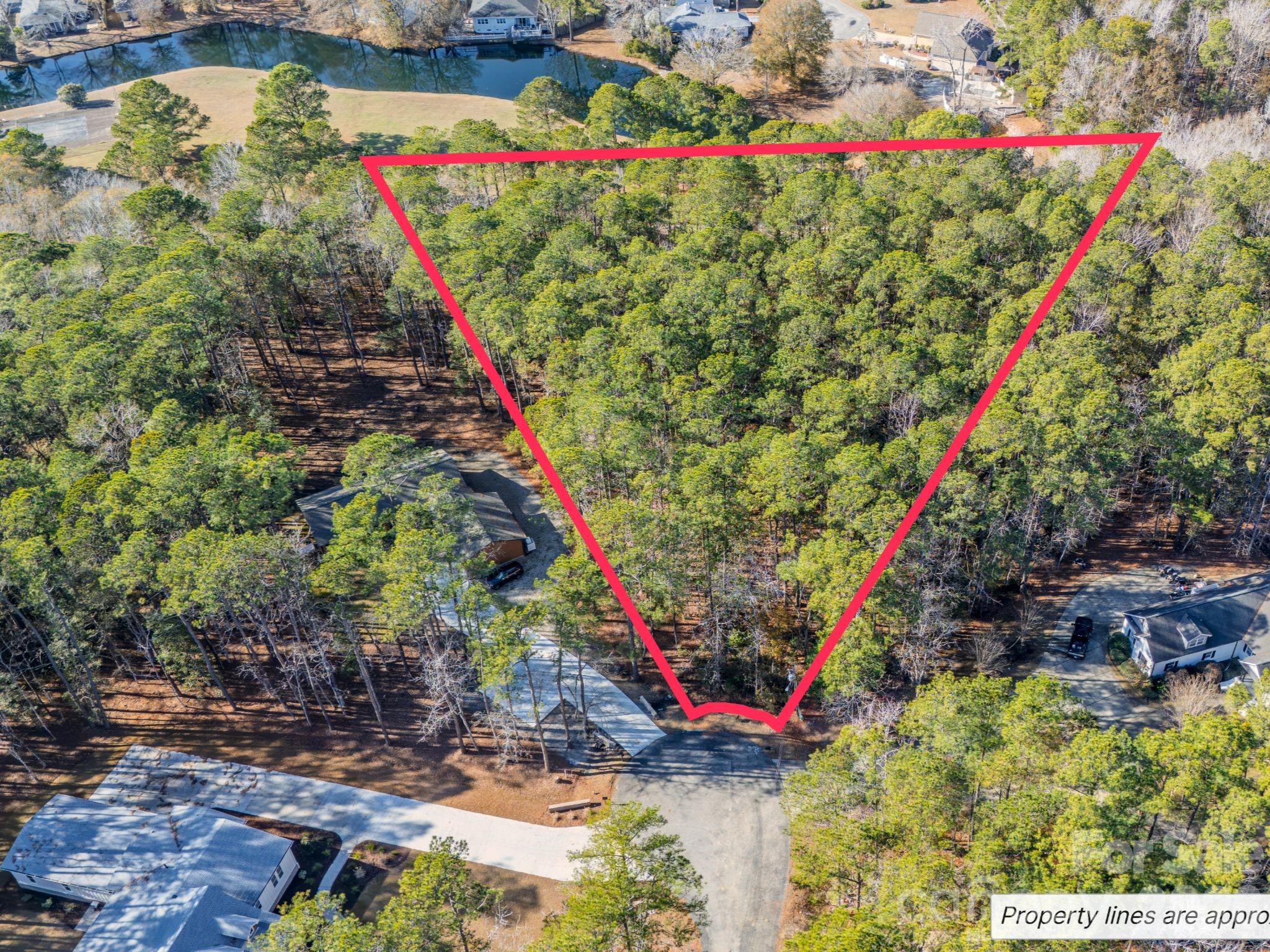 9 Mashie Court Southwest, Unit 9 Calabash, NC 28467 - Photo 12 of 13 a view of a outdoor space