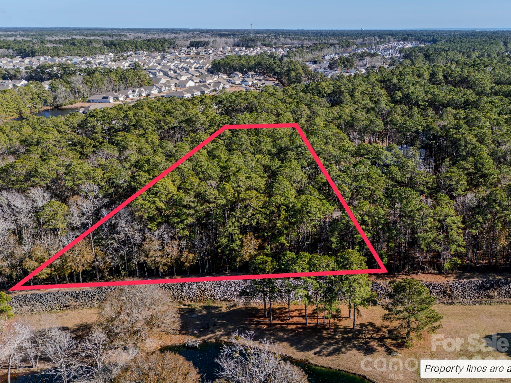 9 Mashie Court Southwest, Unit 9 Calabash, NC 28467 - Photo 4 of 13 a view of a outdoor space