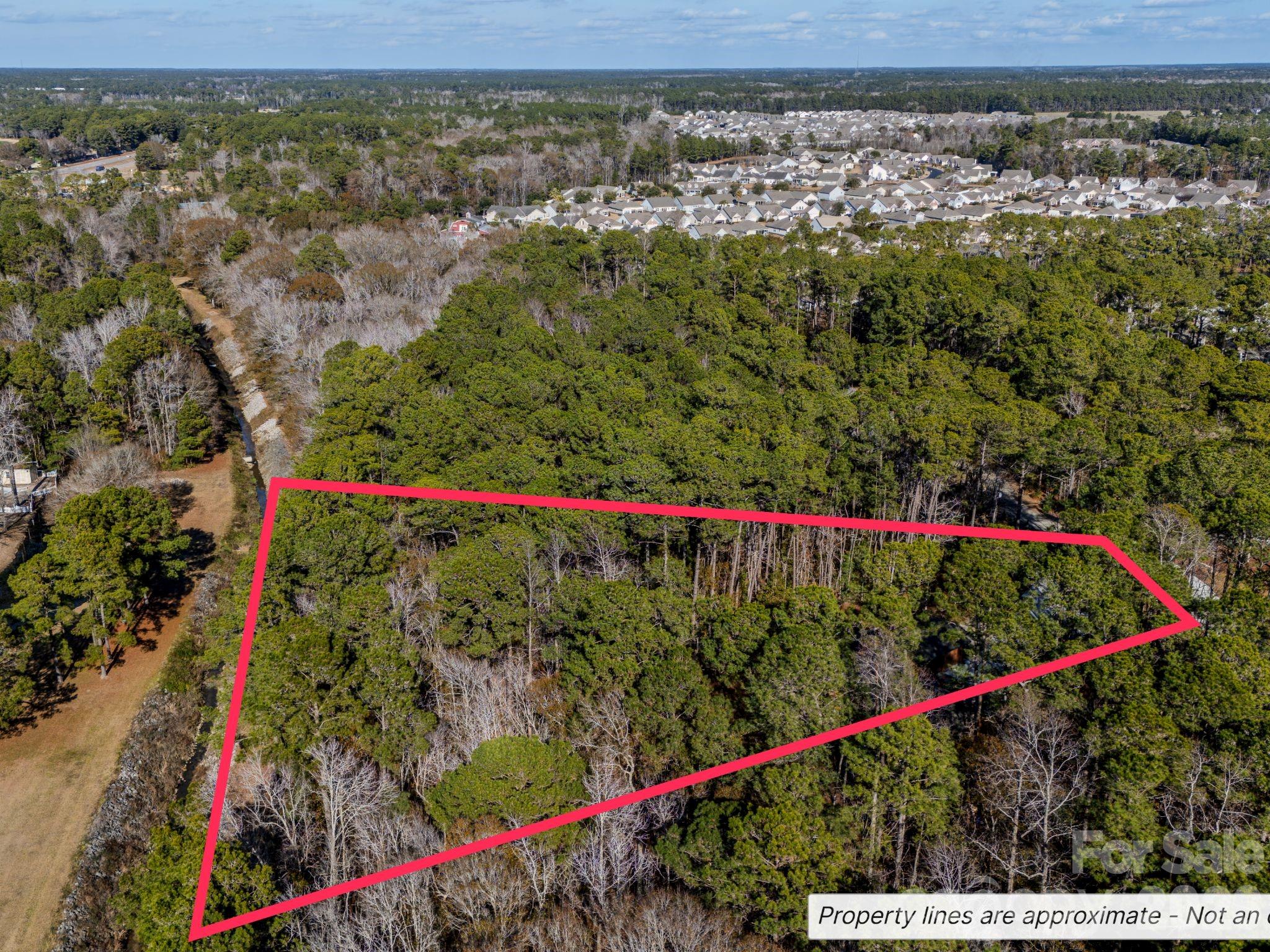 9 Mashie Court Southwest, Unit 9 Calabash, NC 28467 - Photo 5 of 13 a view of a outdoor space