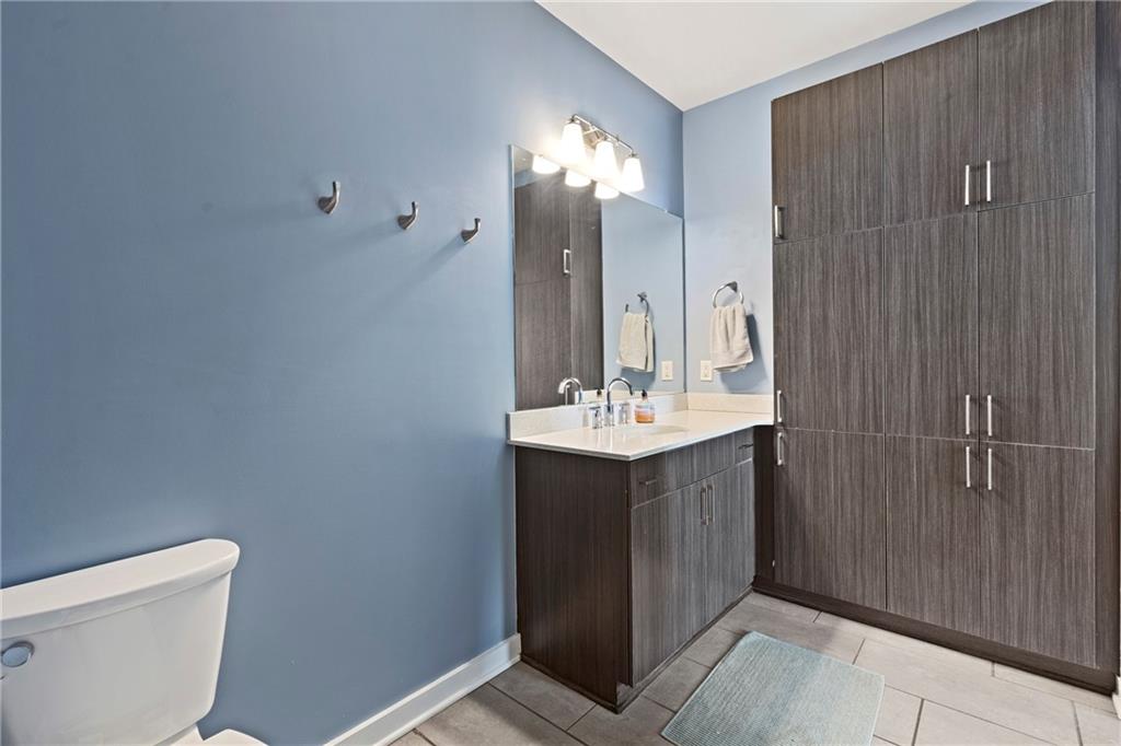 46 Moda Lane Atlanta, GA 30307 - Photo 11 of 31 a bathroom with a sink toilet and shower