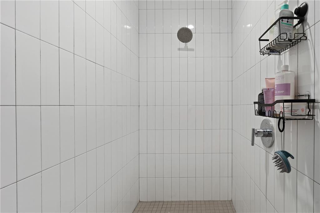 46 Moda Lane Atlanta, GA 30307 - Photo 28 of 31 a bathroom with a shower