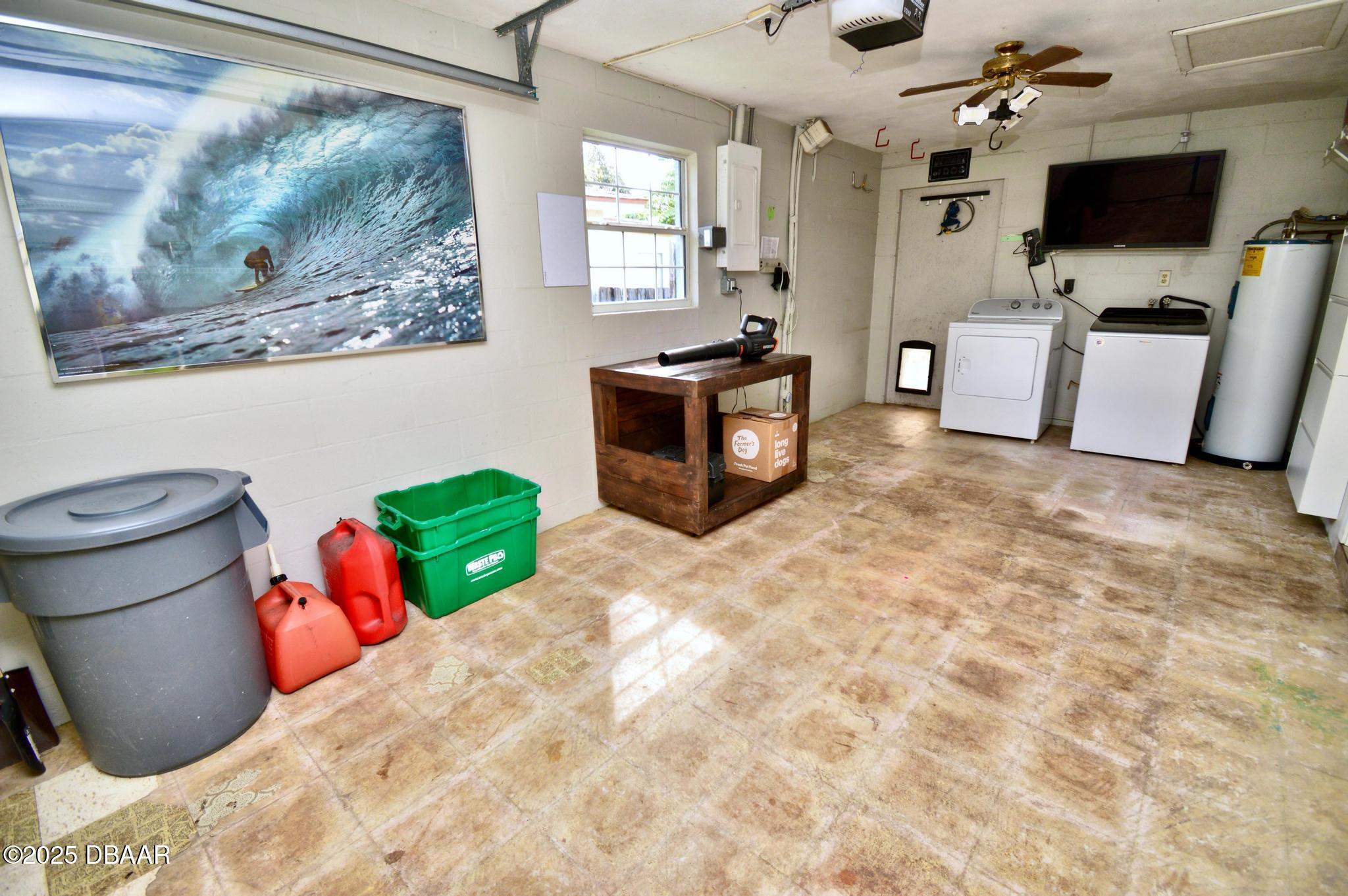 1025 2nd Street Port Orange, FL 32129 - Photo 14 of 33 a bedroom with furniture and flat screen tv