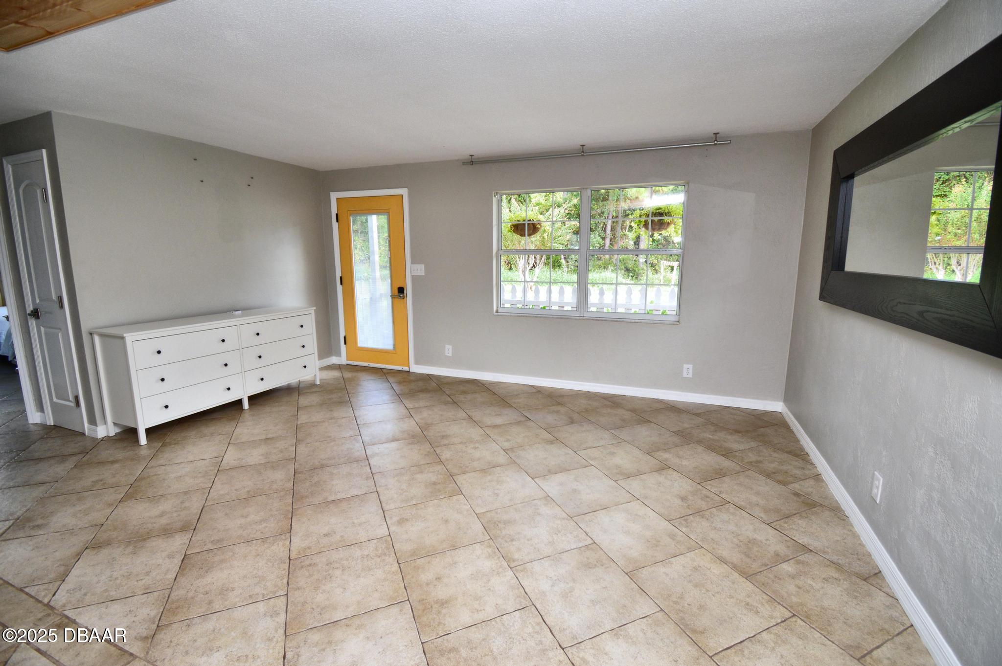 1025 2nd Street Port Orange, FL 32129 - Photo 23 of 33 an empty room with windows