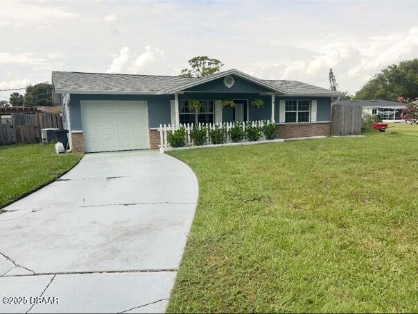 1025 2nd Street Port Orange, FL 32129 - Photo 3 of 33 a view of a white house with a yard and potted plants