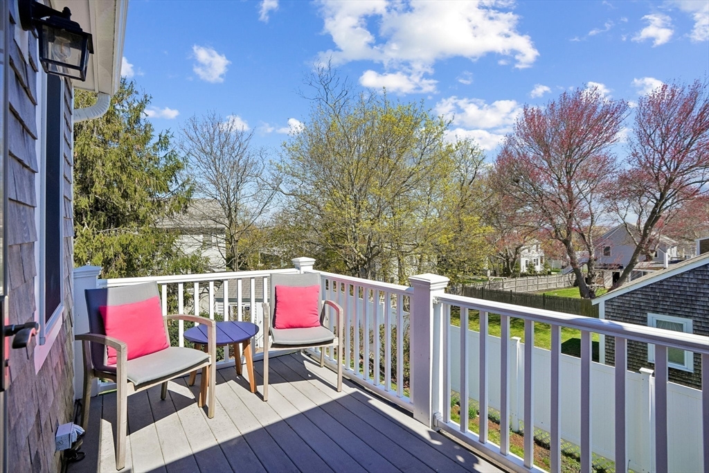 12 Hawley Road Scituate, MA 02066 - Photo 3 of 24 a view of a chairs and tables in the balcony