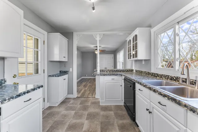 a big room with windows and closet