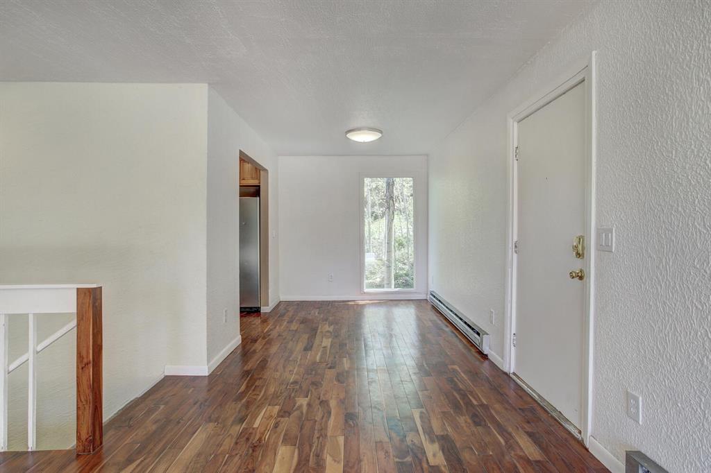 347 Deer Path Road Dillon, CO 80435 - Photo 14 of 26 a view of hallway with window and wooden floor