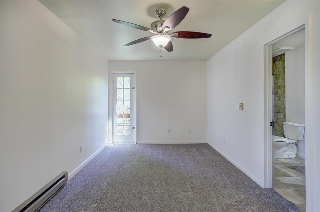 347 Deer Path Road Dillon, CO 80435 - Photo 17 of 26 an empty room with fan and windows
