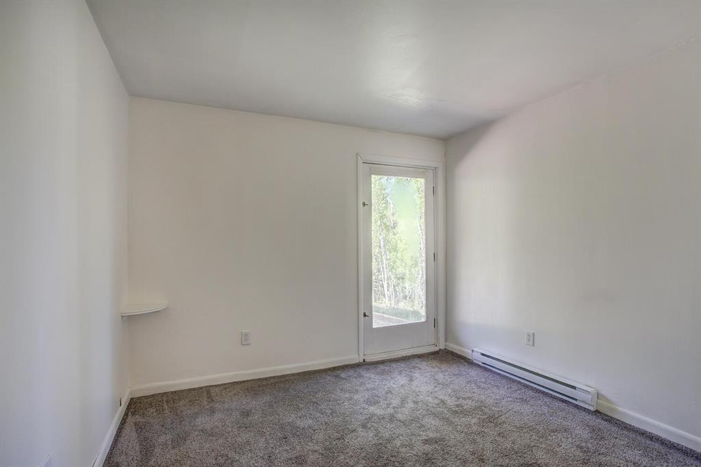 347 Deer Path Road Dillon, CO 80435 - Photo 18 of 26 an empty room with windows