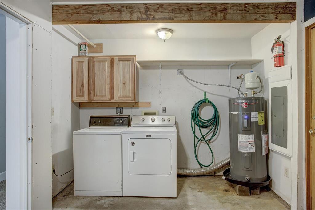 347 Deer Path Road Dillon, CO 80435 - Photo 24 of 26 a utility room with dryer and washer