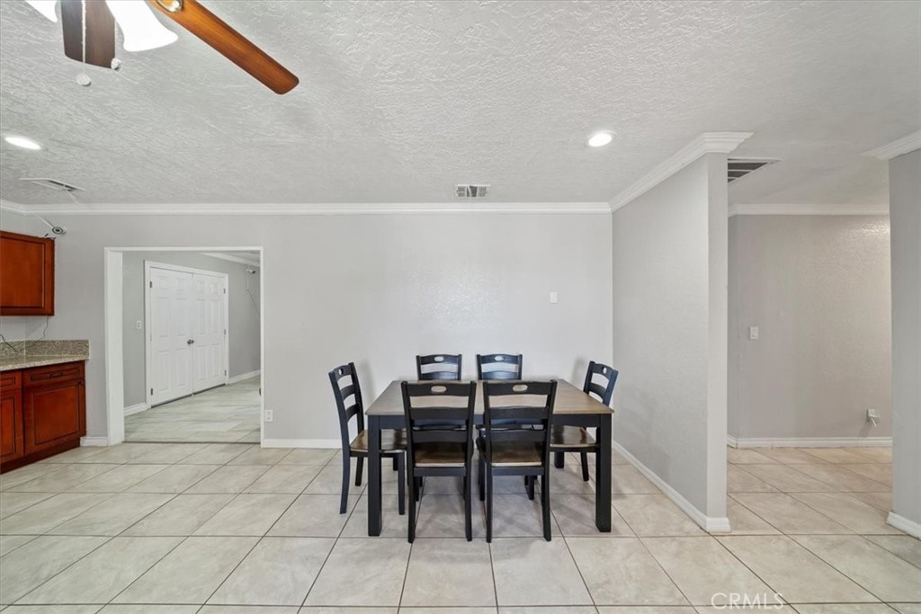 20548 Neuralia Road California City, CA 93505 - Photo 19 of 49 a view of a dining room with furniture