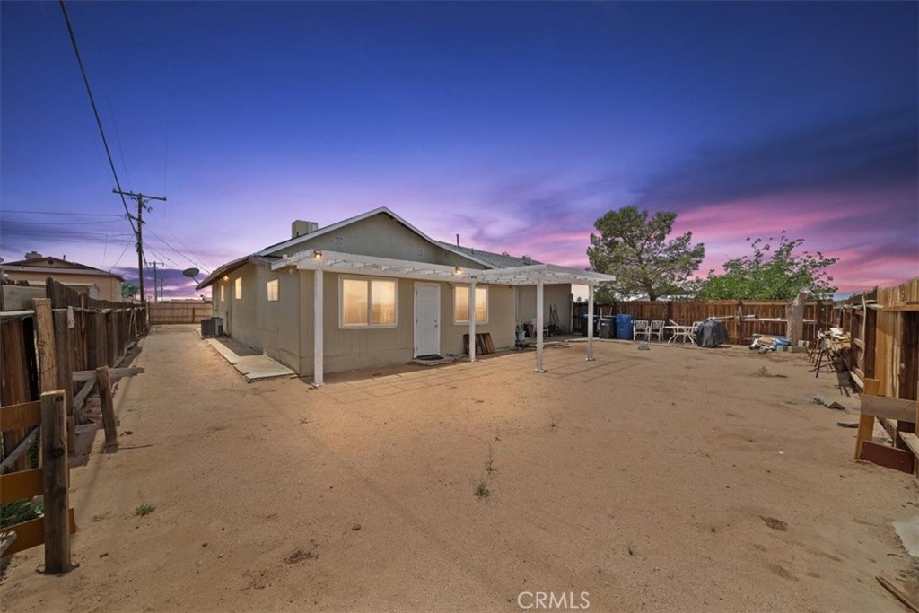 20548 Neuralia Road California City, CA 93505 - Photo 42 of 49 a view of a house with a yard