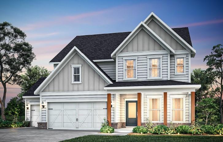 303 Rockledge Bend Southwest Powder Springs, GA 30127 - Photo 1 of 18 a front view of a house with garage