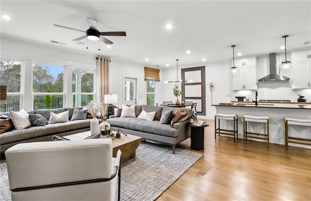 303 Rockledge Bend Southwest Powder Springs, GA 30127 - Photo 4 of 18 a living room with furniture and a large window