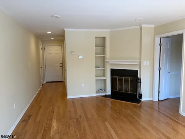 a view of a livingroom with a fireplace