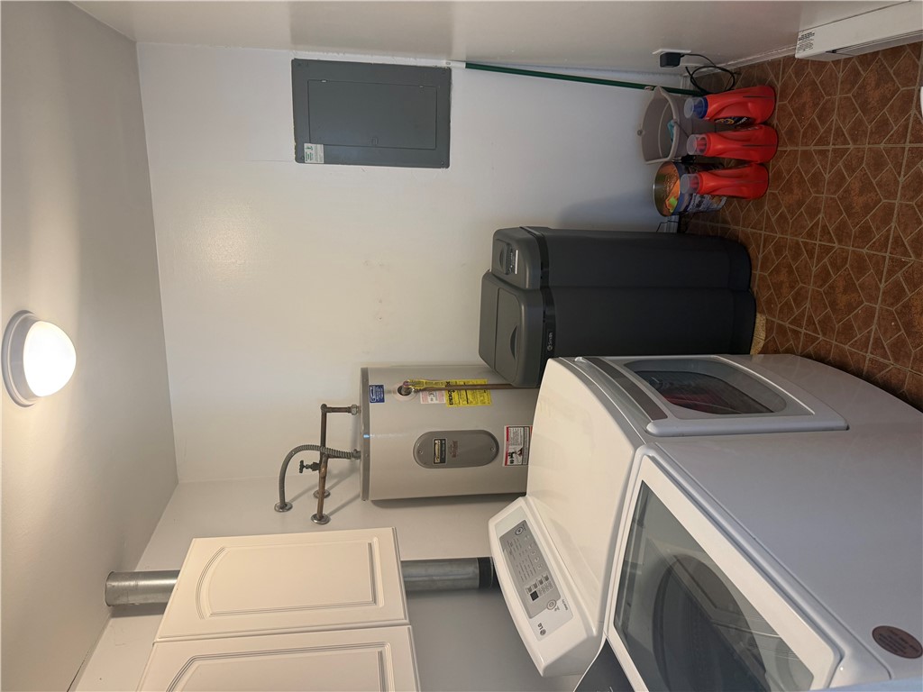 5840 Pitchin Road South Springfield, OH 45502 - Photo 8 of 18 This dedicated laundry area offers practical amenities for effortless home management.
