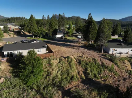 a view of a street with a houses
