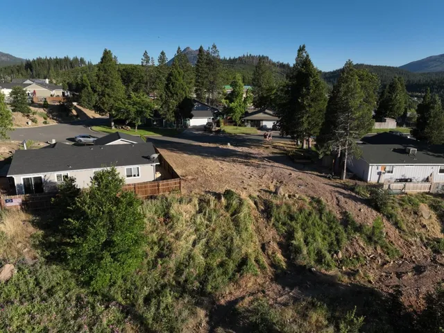 a view of a street with a houses