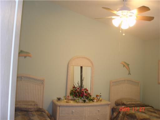 2531 Northwest Windemere Drive Stuart, FL 34994 - Photo 10 of 16 a living room with furniture and a potted plant