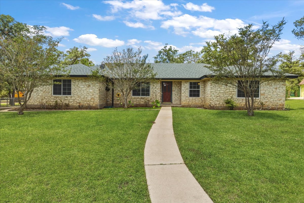 250 Hickory Drive Elgin, TX 78621 - Photo 1 of 37 a front view of house with yard and green space