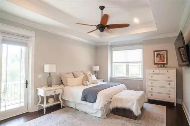 a spacious bathroom with a double vanity sink a toilet and a shower