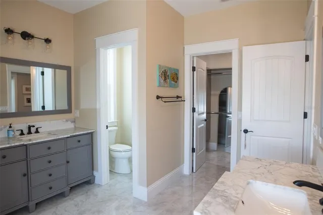 a view of a backyard with fence