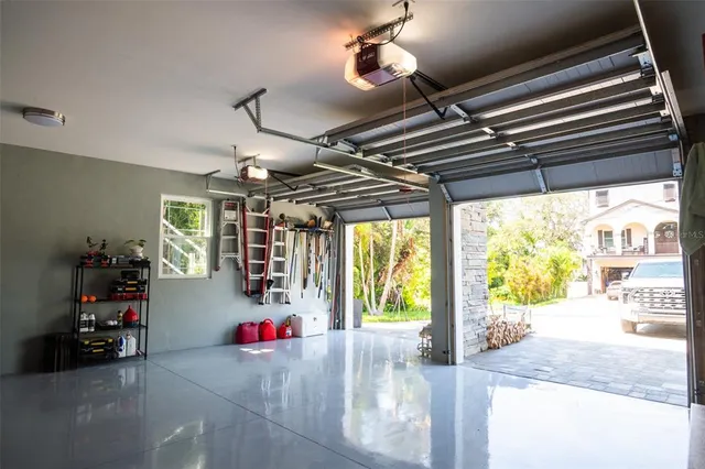 a view of a livingroom with furniture and a flat screen tv