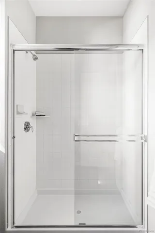 a bathroom with a glass shower