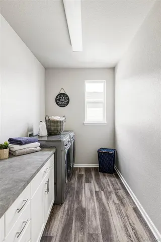 a view of an empty room with stairs