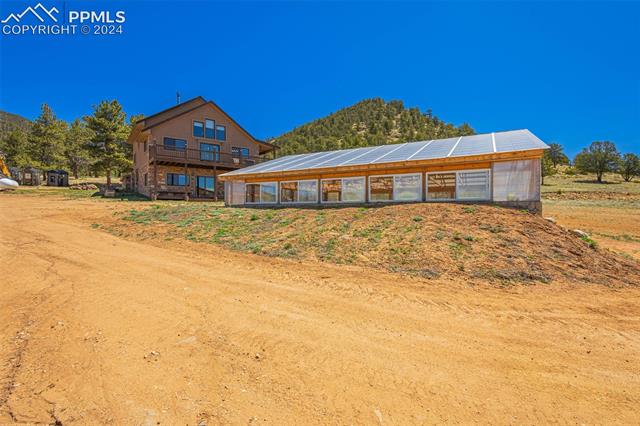 211 Yarnell Road Lake George, CO 80827 - Photo 38 of 50 View of front of home featuring an outdoor structure