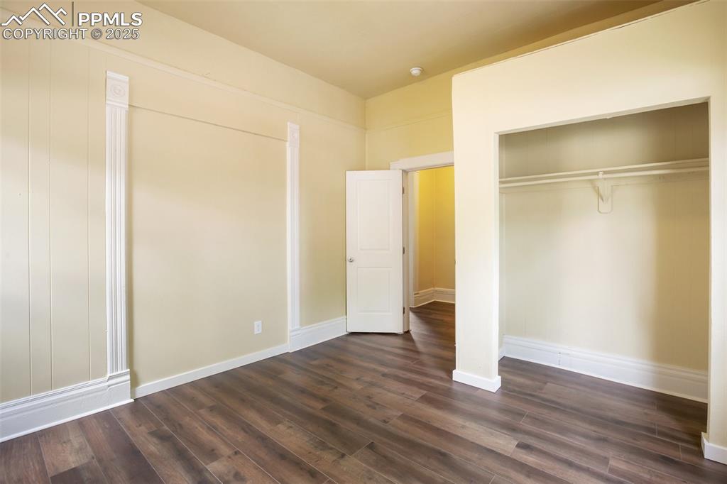 Undisclosed Address Pueblo, CO 81004 - Photo 12 of 23 a view of empty room with wooden floor