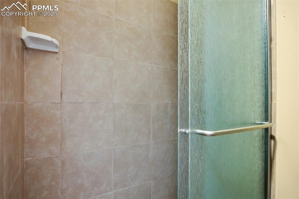 Undisclosed Address Pueblo, CO 81004 - Photo 14 of 23 a bathroom with a shower