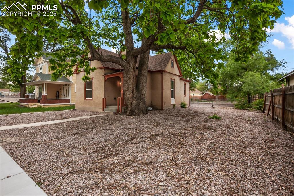 Undisclosed Address Pueblo, CO 81004 - Photo 23 of 23 a view of a house with a yard
