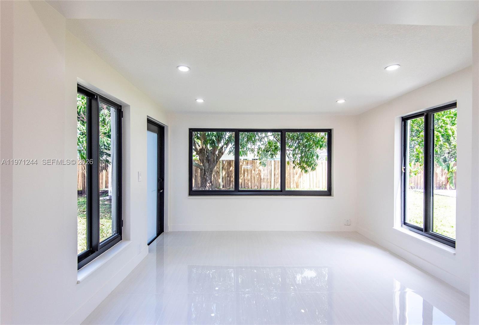 11861 Southwest 185th Terrace Miami, FL 33177 - Photo 15 of 34 an empty room with windows and view