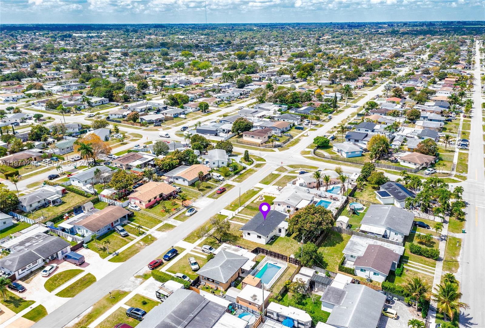 11861 Southwest 185th Terrace Miami, FL 33177 - Photo 34 of 34 an aerial view of residential houses with outdoor space