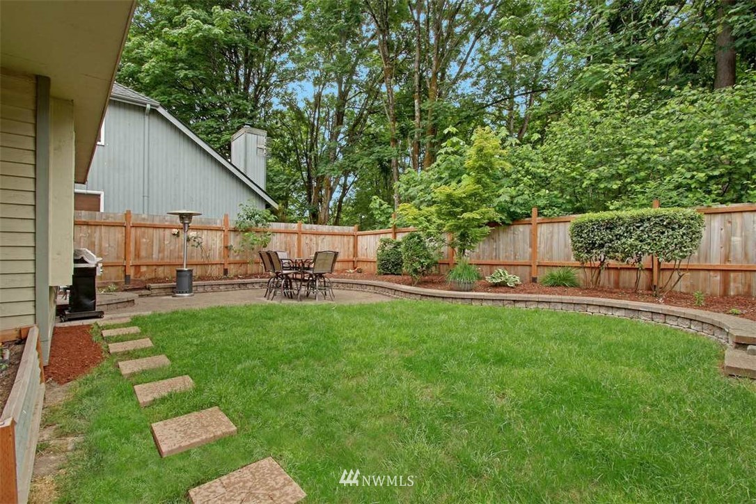 2227 Southeast 8th Place Renton, WA 98057 - Photo 17 of 21 a view of backyard with sitting area