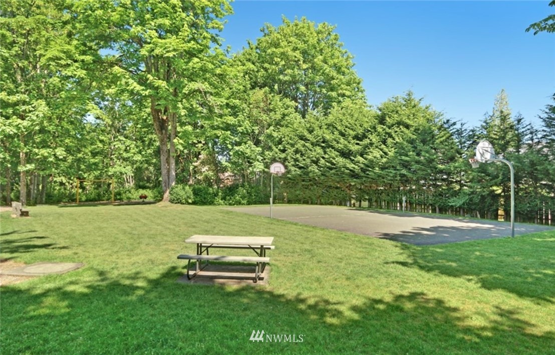 2227 Southeast 8th Place Renton, WA 98057 - Photo 20 of 21 a view of a park with large trees