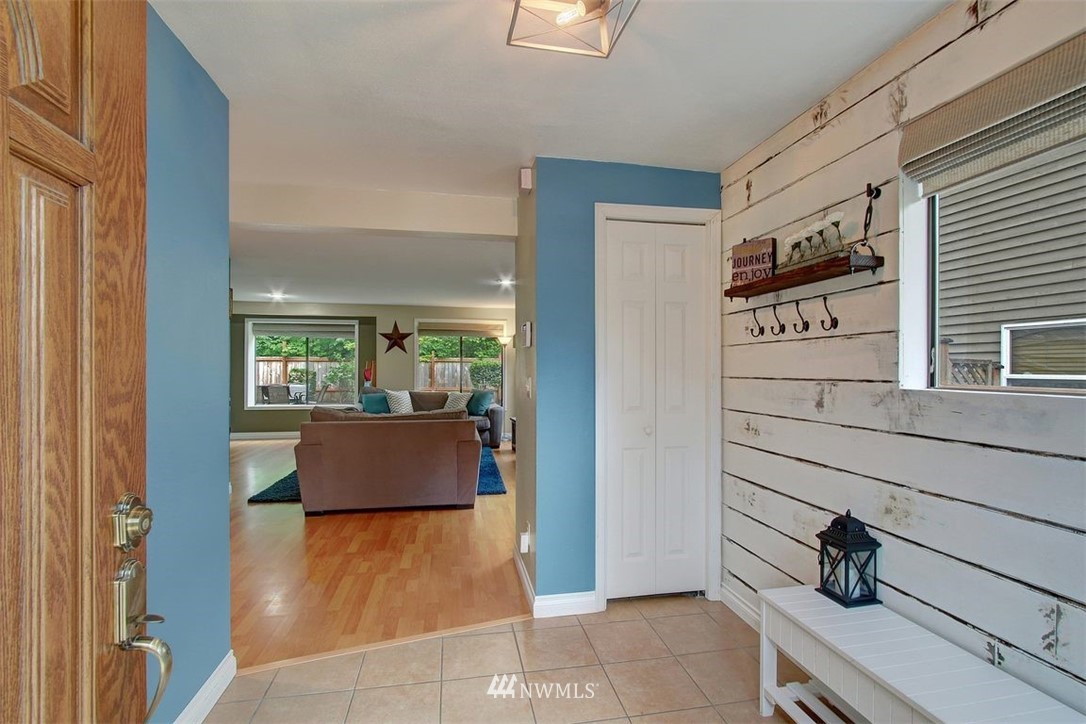 2227 Southeast 8th Place Renton, WA 98057 - Photo 3 of 21 a view of kitchen with furniture and window