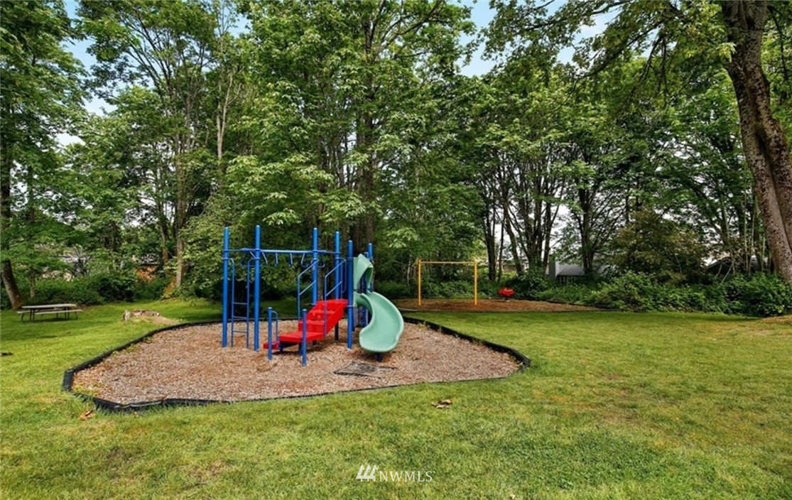 2227 Southeast 8th Place Renton, WA 98057 - Photo 21 of 21 a view of a park with slide