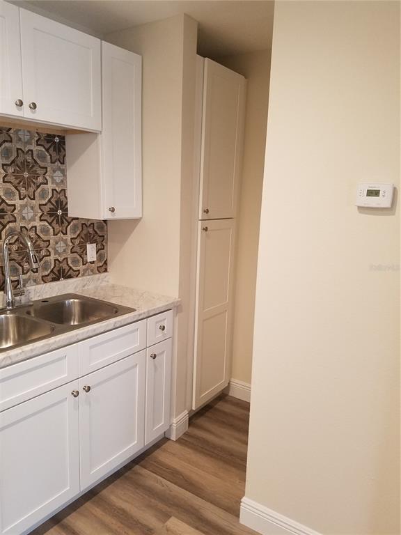 505 Boxelder Avenue Altamonte Springs, FL 32714 - Photo 3 of 10 a kitchen with a sink and cabinets
