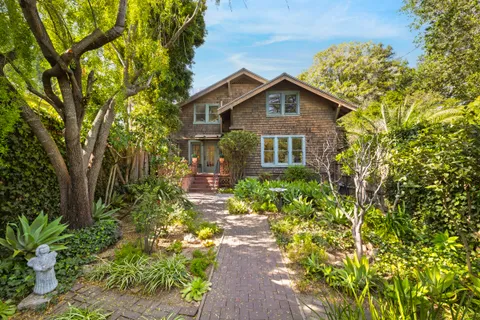 a view of a back yard of the house