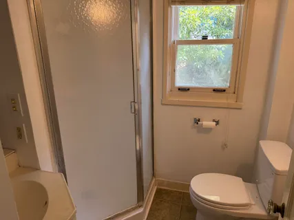 a backyard of a house with seating space