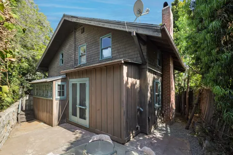 a backyard of a house with lots of green space
