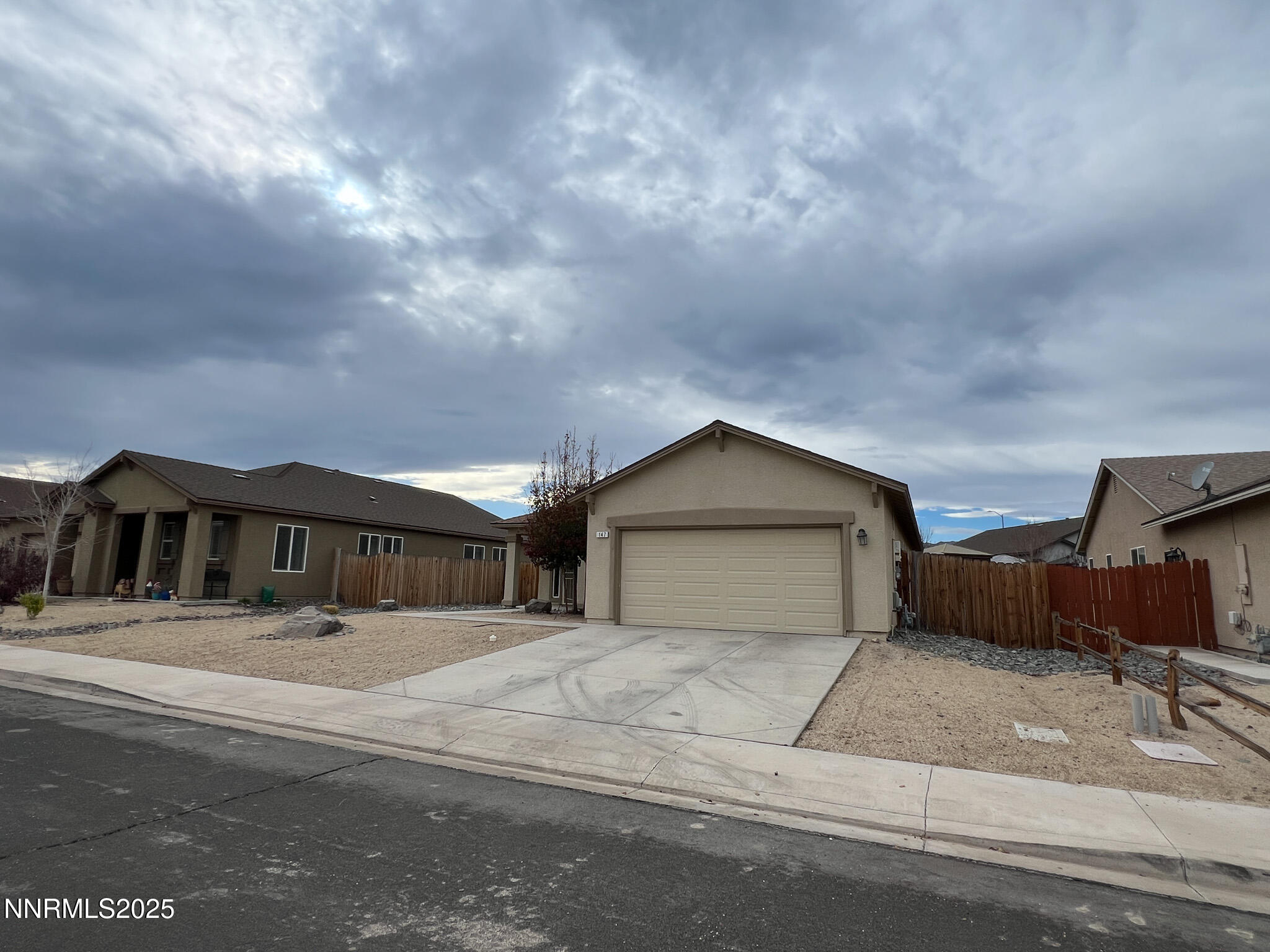 147 Walnut Drive Fernley, NV 89408 - Photo 3 of 31 a view of a house with a outdoor space
