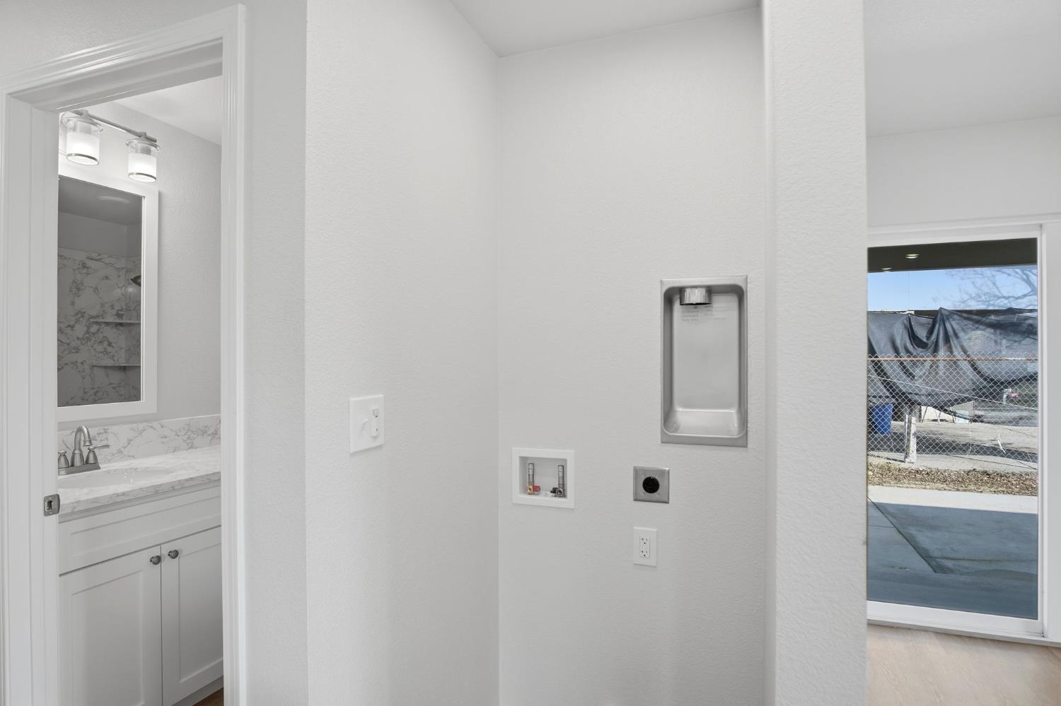 3447 Manchester Road Atwater, CA 95301 - Photo 13 of 31 a bathroom with a sink and a mirror